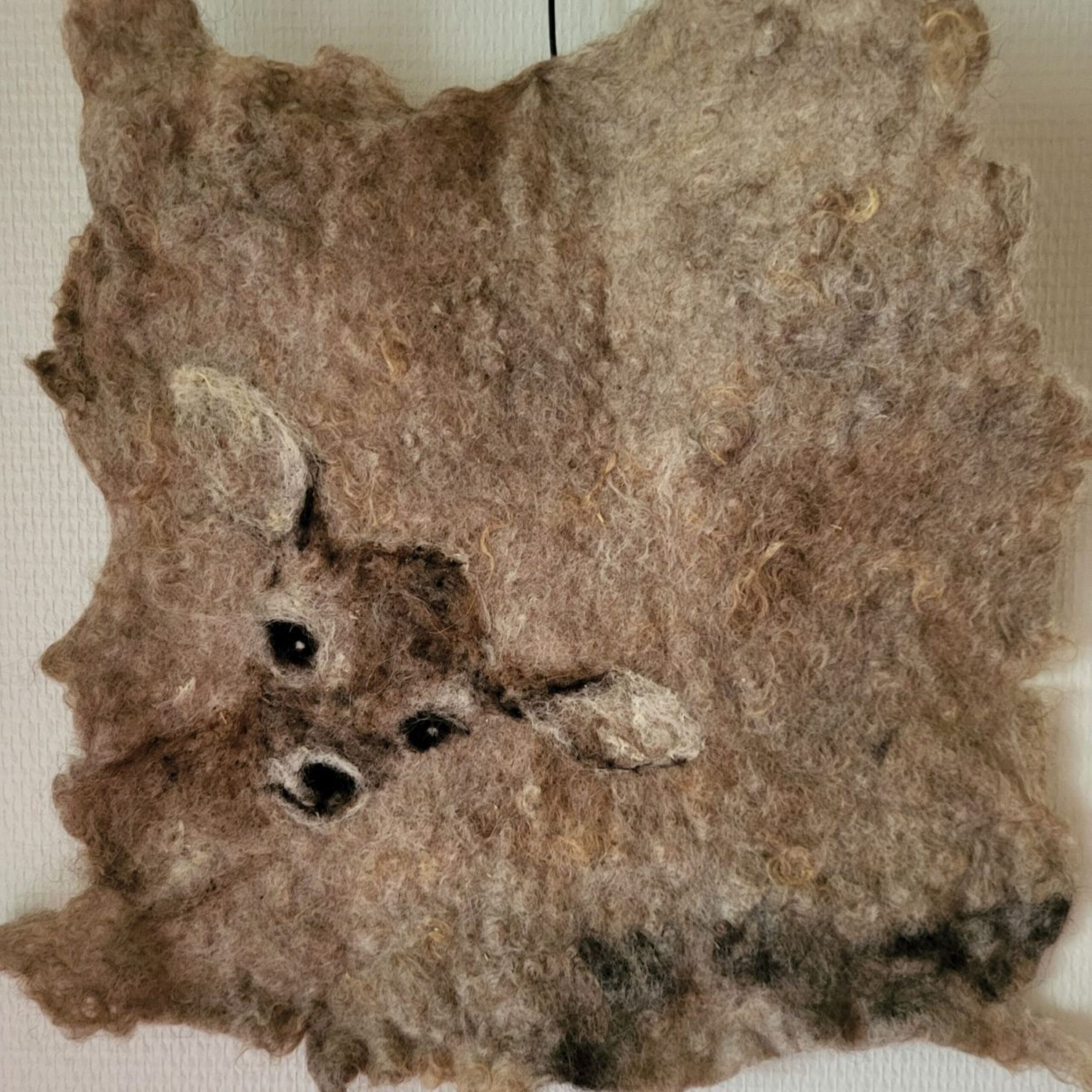 Huovutettu istuinalusta, kuvana bambi