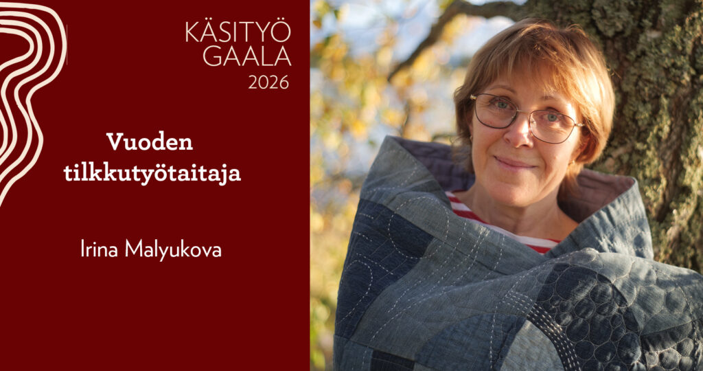 Irina Malyukova kietoutuneena tikattuun peittoon.