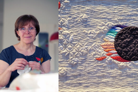 Irina Malyakova ompelee tilkkutyötä.